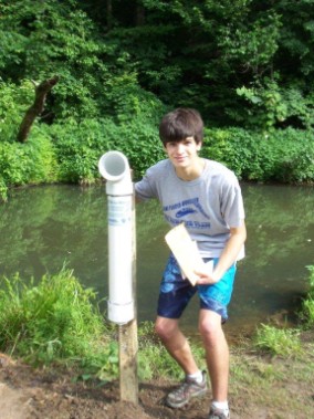Jake Peacock, student at Haddonfiled Memorial High School, at the Driscol Pond collecton bin